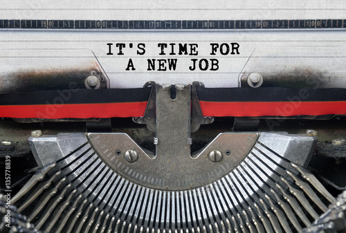 IT’S TIME FOR A NEW JOB Typed Words On a Vintage Typewriter Conceptual