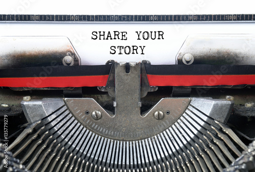 SHARE YOUR STORY typed words on a Vintage Typewriter Conceptual
