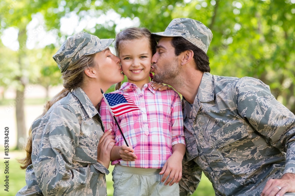Military couple with their daughter Military couple with their daughter
