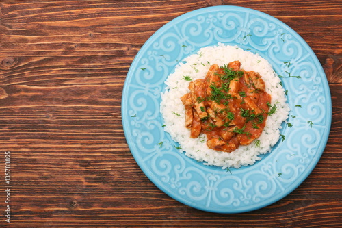 Rice with meat in tomato sause