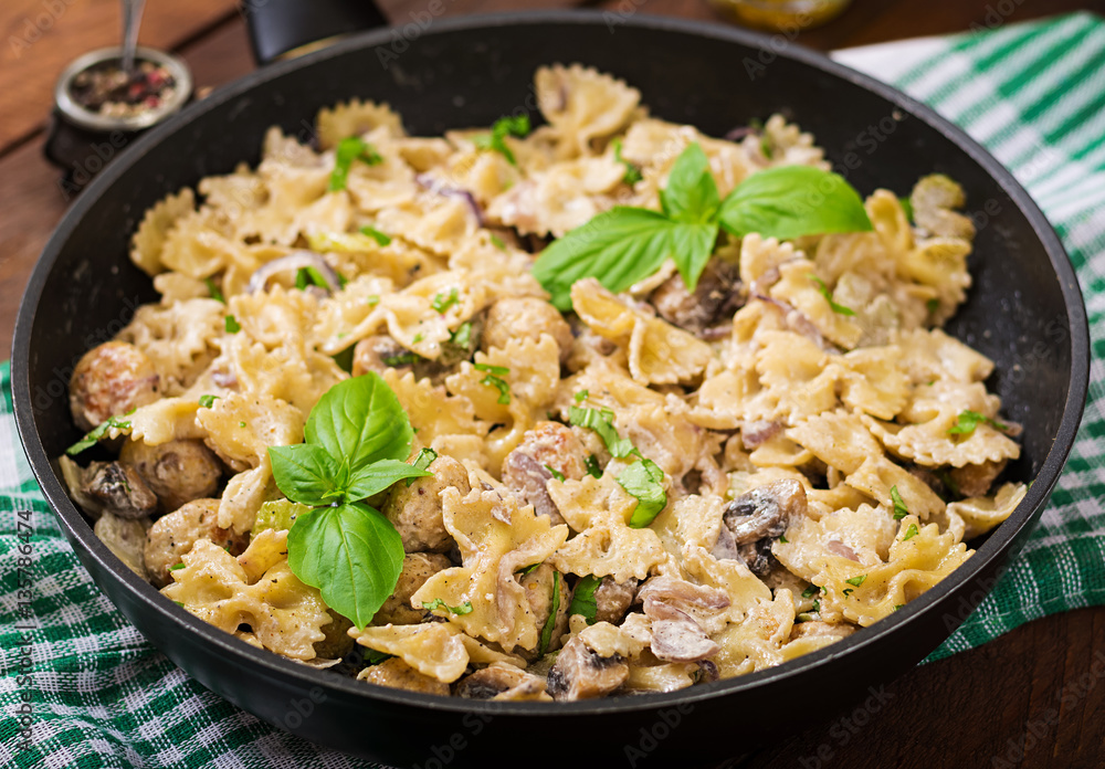 Pasta with meatballs and mushrooms in creamy sauce Pasta with meatballs and mushrooms in creamy sauce