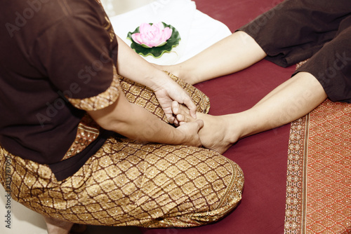 Thai massage. Women pay attention to relaxation and health.