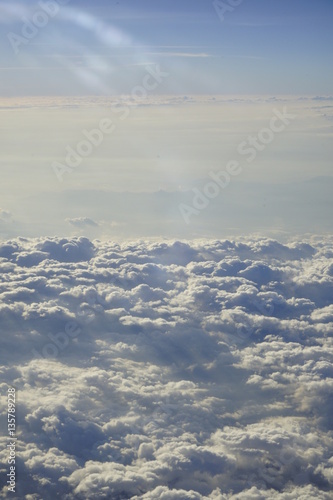 sunlight shed on clouds and mist shot on air plane