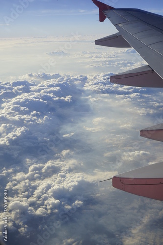 sunlight shed on clouds and mist shot on air plane