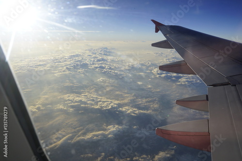sunlight shed on clouds and mist shot on air plane
