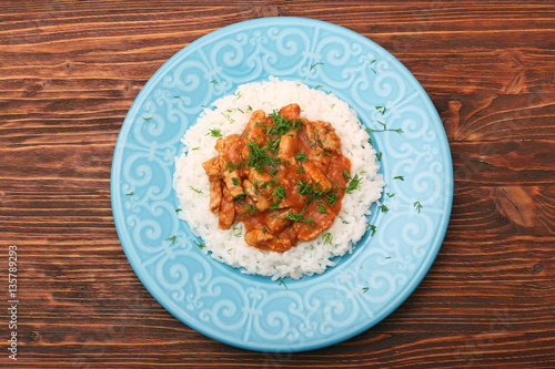 Rice with meat in tomato sause