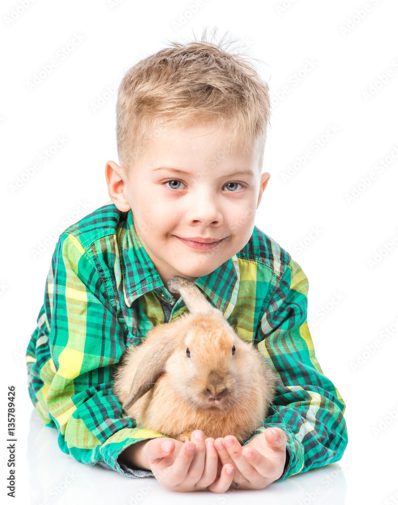 Young boy embracing rabbit. Isolated on white background Young boy embracing rabbit. Isolated on white background