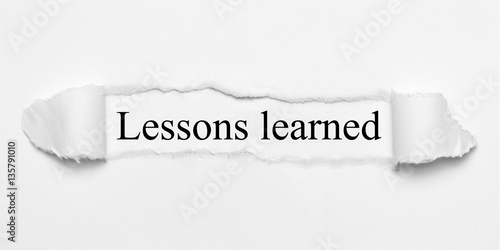 Fotografija Lessons learned on white torn paper