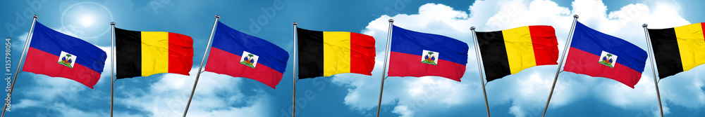 Haiti flag with Belgium flag, 3D rendering Haiti flag with Belgium flag, 3D rendering