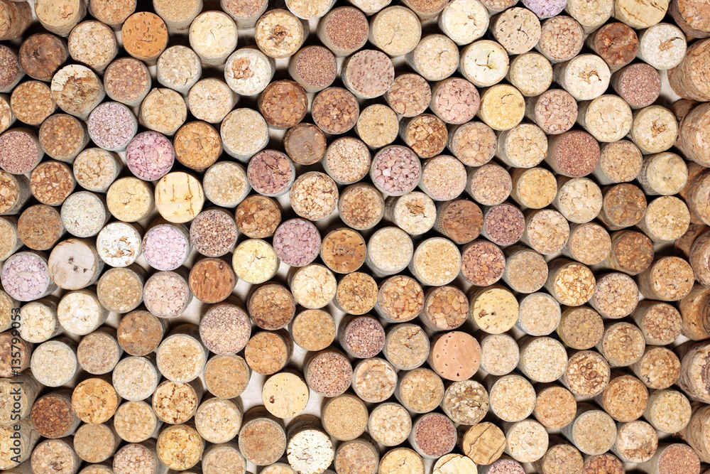 Background of used wine corks. Wall of many different wine corks. Closeup of wine corks. Background of used wine corks. Wall of many different wine corks. Closeup of wine corks.
