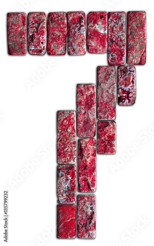 Red number of 7 natural stone isolated on white background