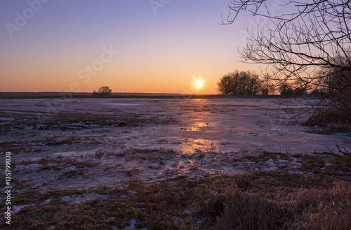 Sunset at the winter evening