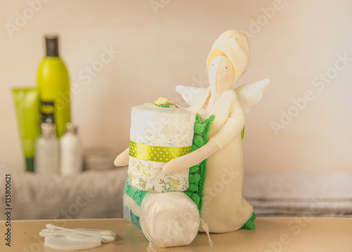 Tilda Doll with cotton buds/bathroom interior photo