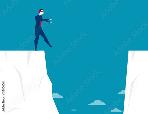Businessman blindfolded and walk to the cliff