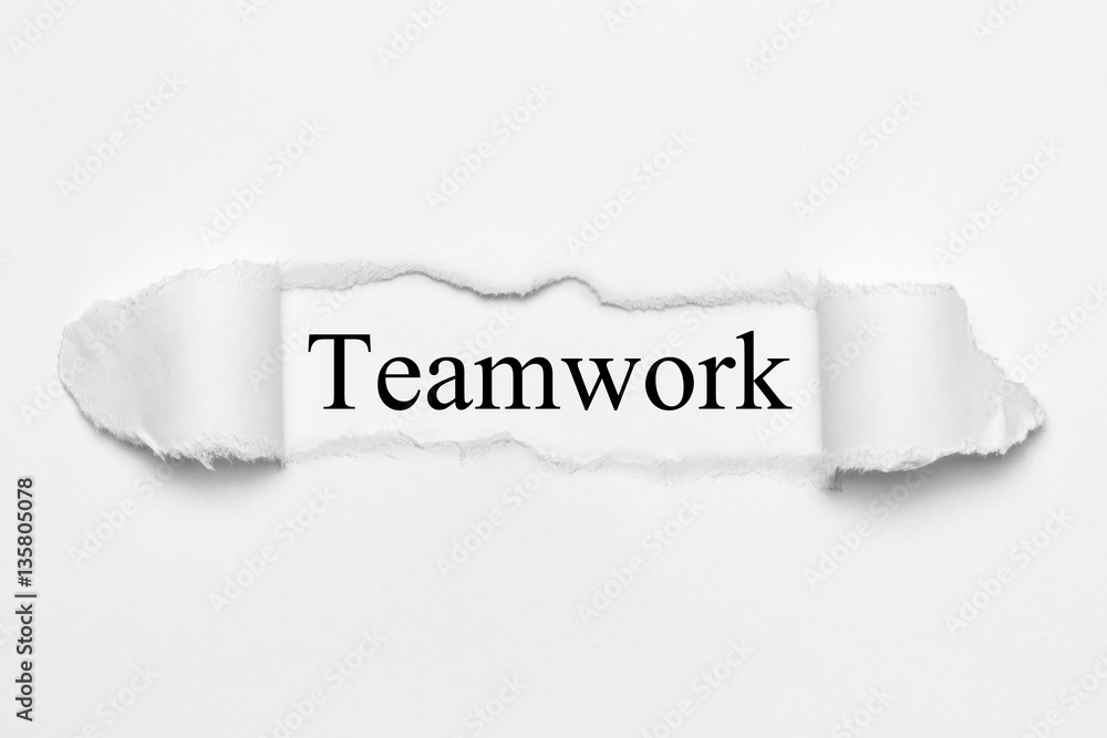 Obraz premium Teamwork on white torn paper