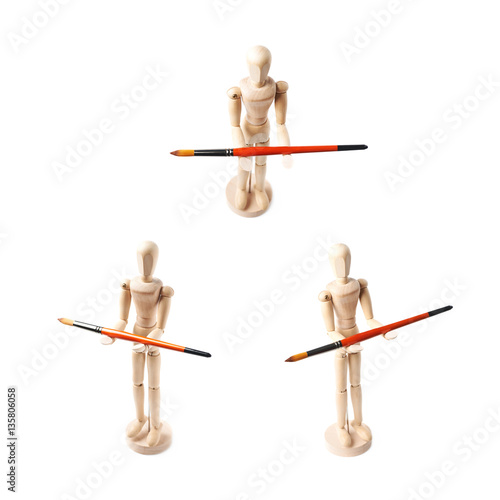 Wooden human statuette isolated