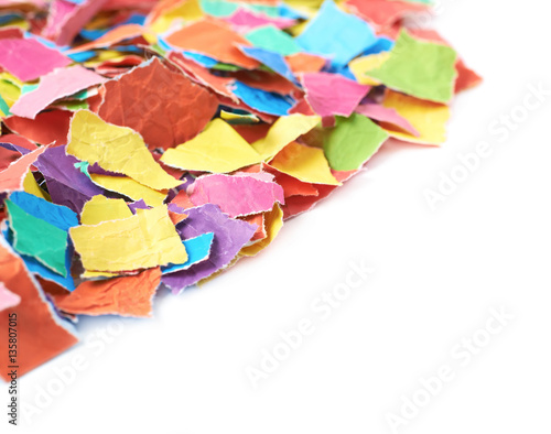 Pile of torn paper pieces i...