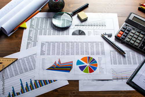 Financial printed paper charts, graphs and diagrams