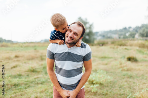Father and son in nature in summer park © ruslan_shramko