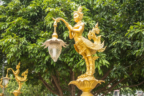 Kinnaree lamp in Wat Pho Rattanaram in Ratchaburi Thailand. photo