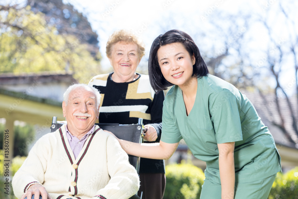 Obraz premium Asian nurse smiling with elderly people with physical problems o