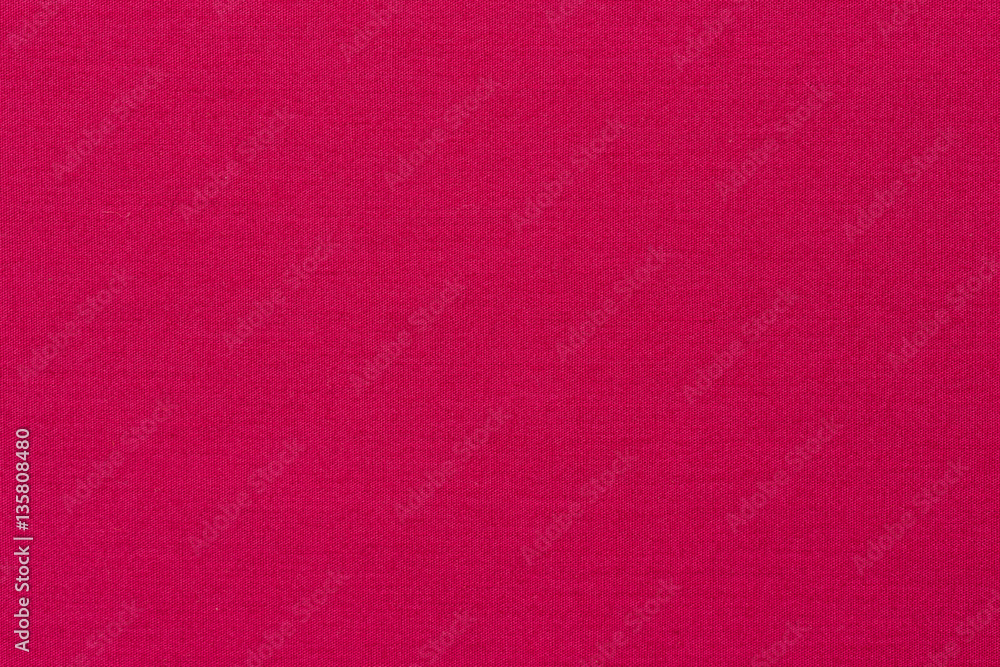 Fototapeta premium Plain pink fabric texture background.