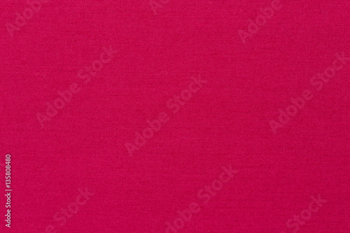 Plain pink fabric texture background.