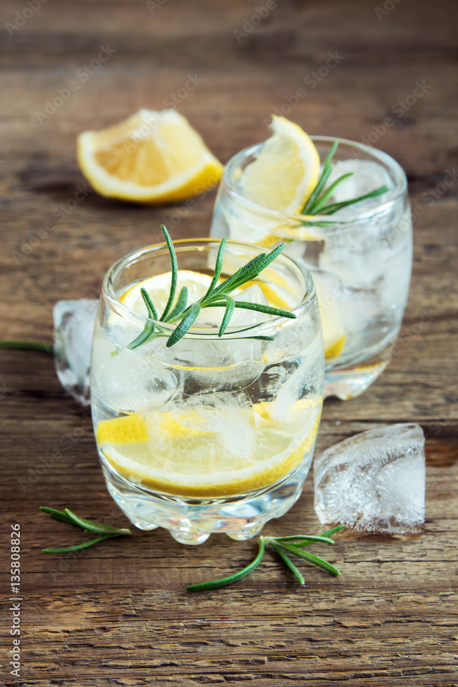 Alcoholic drink  with lemon, rosemary