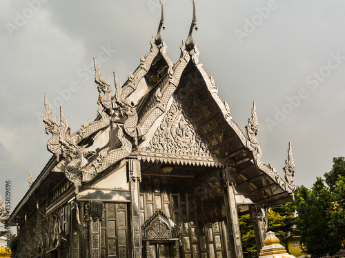 Buddhist temple decorated from stainless steel both outside and inside Wat Pho Rattanaram in Ratchaburi Thailand.