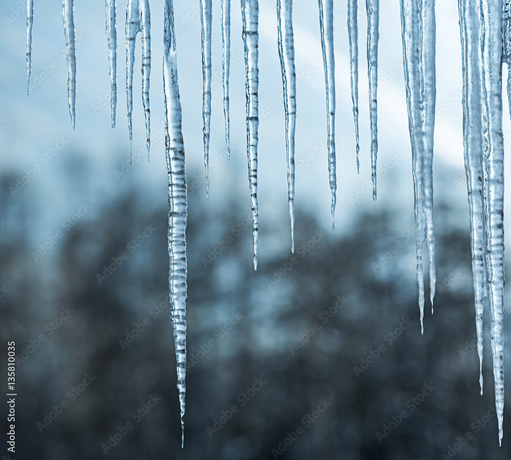 Background of bright transparent icicles. Background of bright transparent icicles.