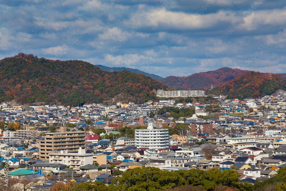 Himeji residence downtown aerial view from Himeji castle in Hyogo, Kansai, Japan during autumn season