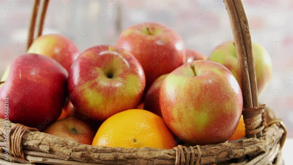 Basket full of fresh red and green apples rotating, Basket full of fresh red and green apples rotating,
