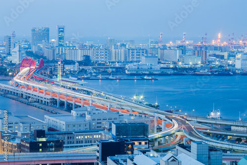 Kobe city road aerial view over sea port, at twilight, Japan photo