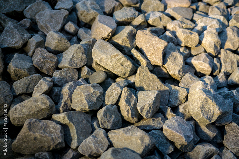 Crushed stone or angular rock is a form of construction aggregate, typically produced by mining a suitable rock deposit and breaking the removed rock down to the desired size using crushers. Crushed stone or angular rock is a form of construction aggregate, typically produced by mining a suitable rock deposit and breaking the removed rock down to the desired size using crushers.