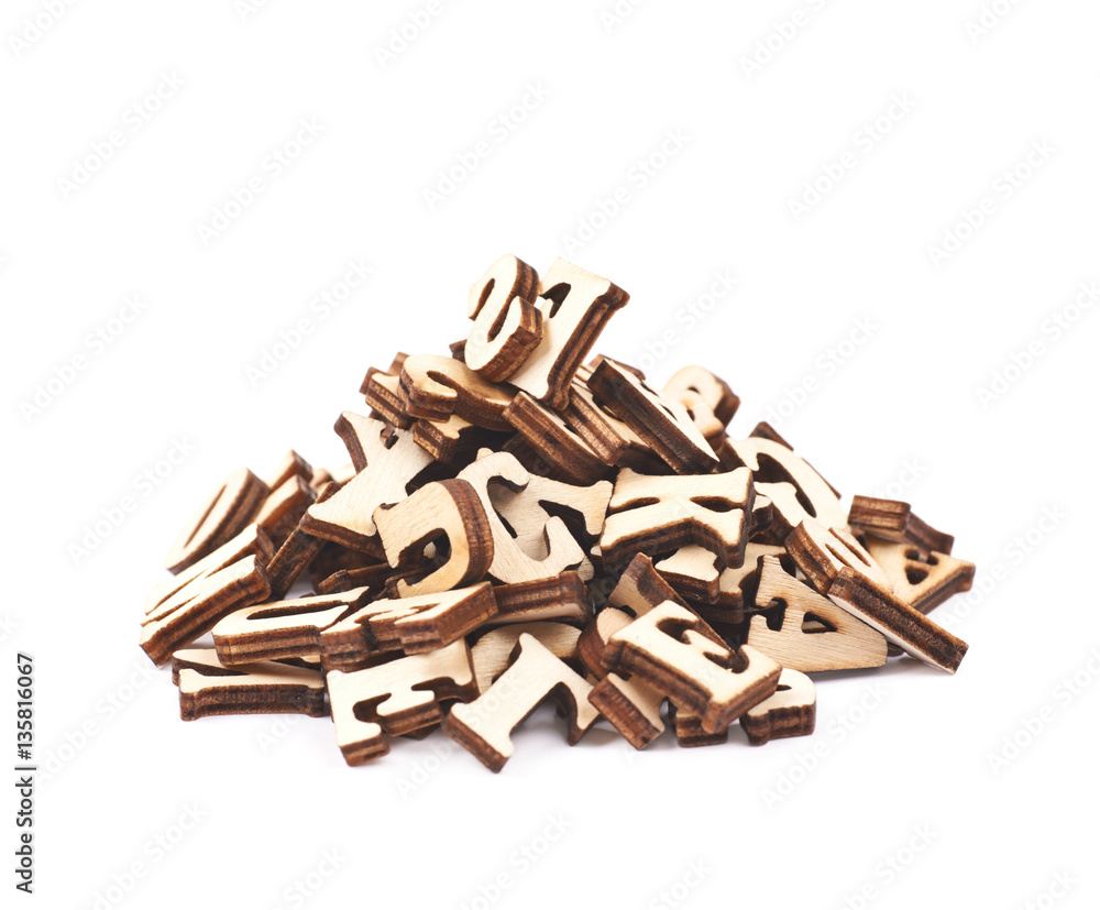Pile of wood carved letters isolated Pile of wood carved letters isolated