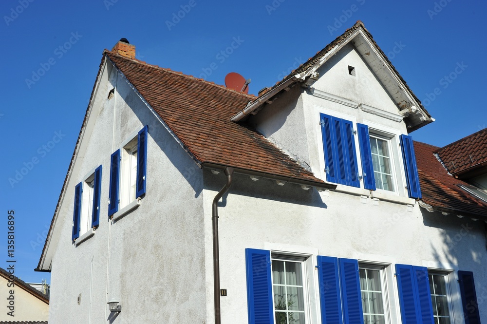 Renovated House-Front with Dormer Window (Gauben) at tiled Roof (Ziegeldach)