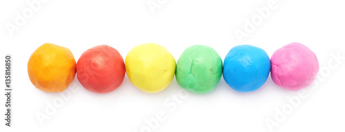 Lined up plasticine balls isolated