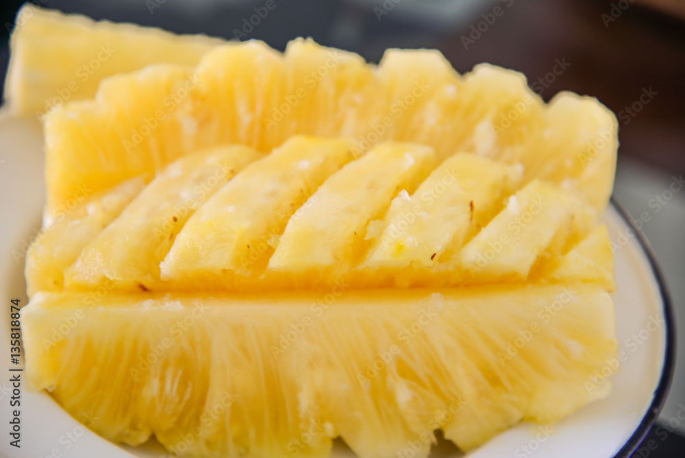 Close-up flesh of a pineapple slice. Close-up flesh of a pineapple slice.