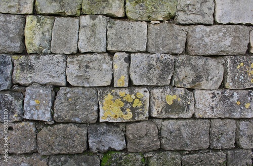 Texture of the stone wall. Dark granite as modern grunge design.