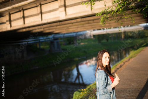 Woman on sidewalk in the city