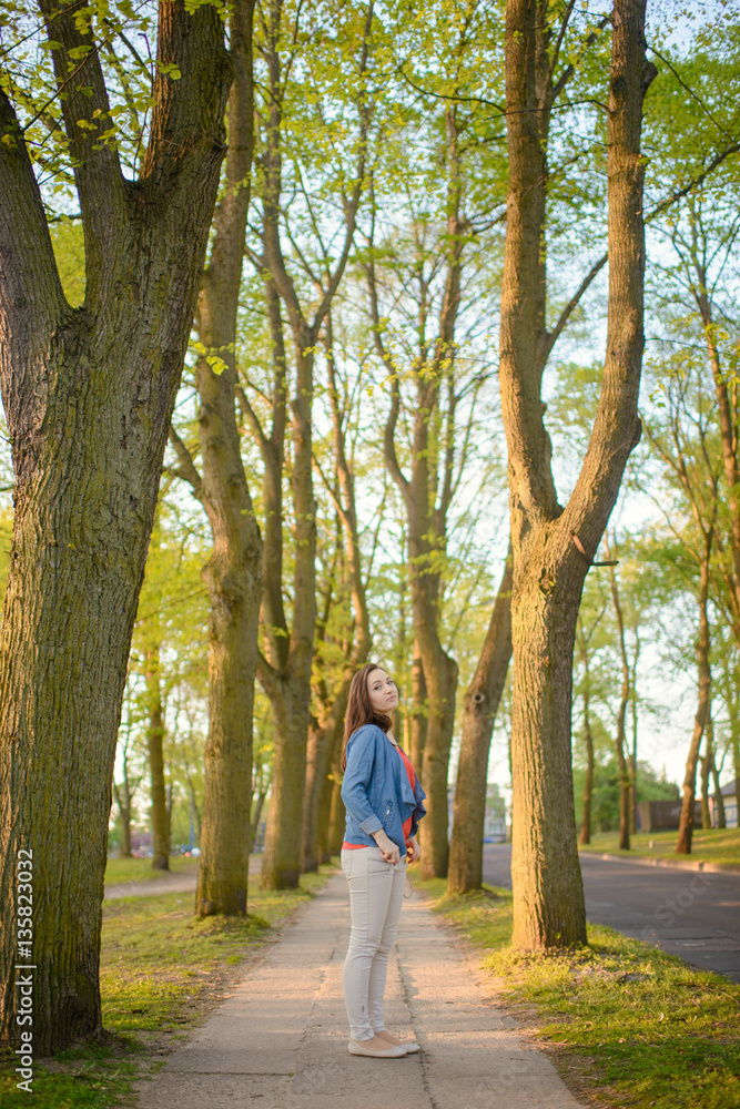 Woman on sidewalk in the city