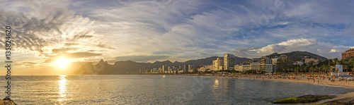 Panoramic landscape of the beaches of Arpoador  Ipanema and Leblon in Rio de Janeiro during sunset with sky and the hill Two brothers and G  vea stone in the background