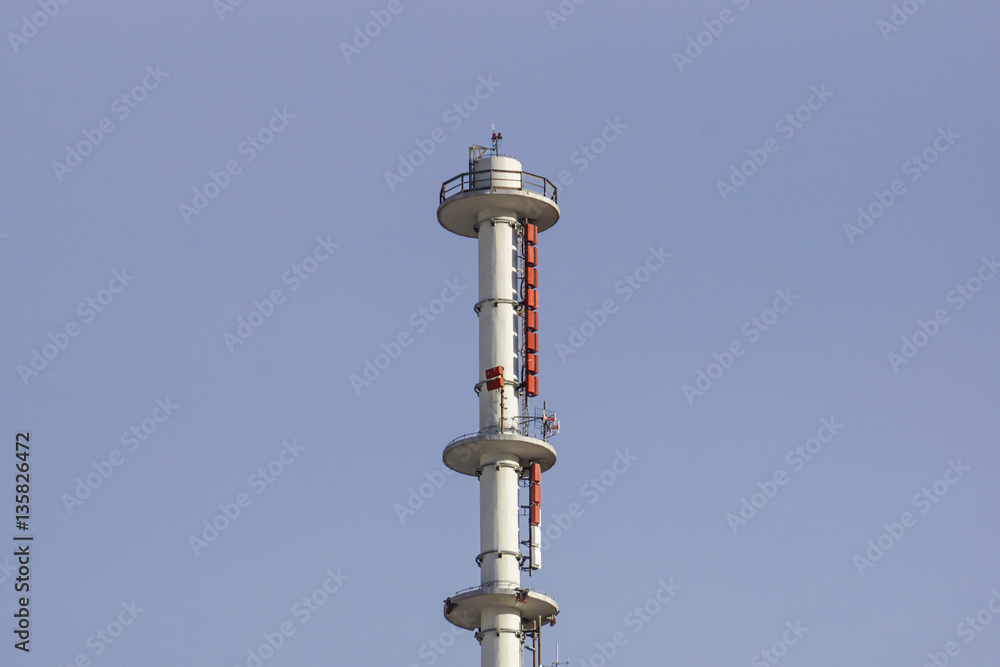 Cellphone telecomunication tower with blue sky Cellphone telecomunication tower with blue sky