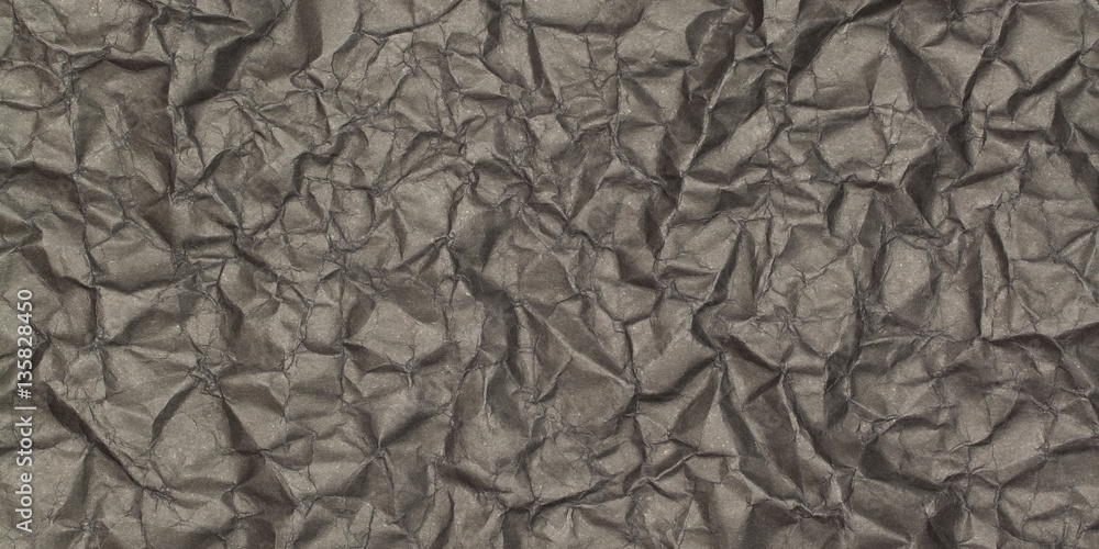 abstract background of crumpled black paper with blotches abstract background of crumpled black paper with blotches