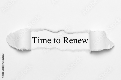 Time to Renew on white torn paper