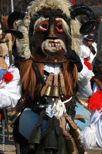 Pernik, Bulgaria - January 28, 2017: Masquerade festival Surva in Pernik, Bulgaria. People with mask called Kukeri dance and perform to scare the evil spirits