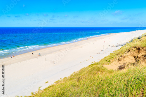 Grass dune overlooking beautiful Kampen beach  Sylt island  Germany