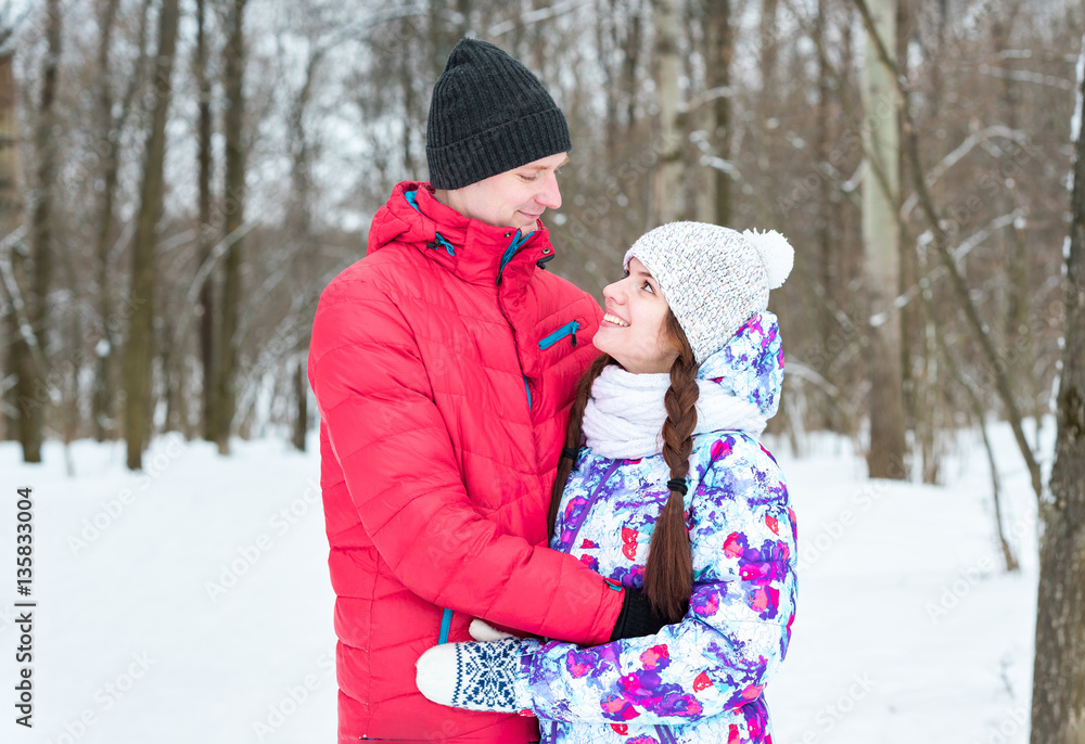 love couple smiles in winter park