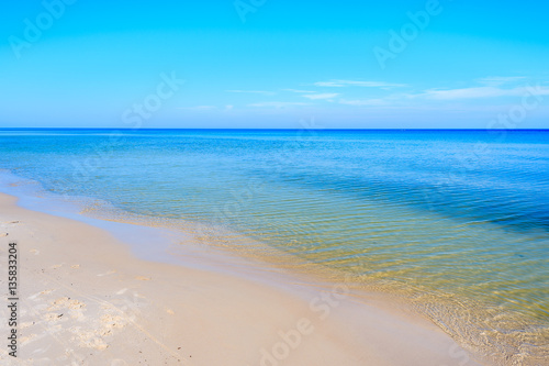 Clear azure sea water of Leba beach, Baltic Sea, Poland © pkazmierczak