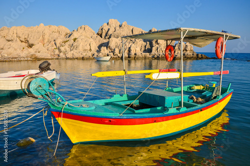 Colorful Greek fishing boat on coast of Rhodes island  Greece